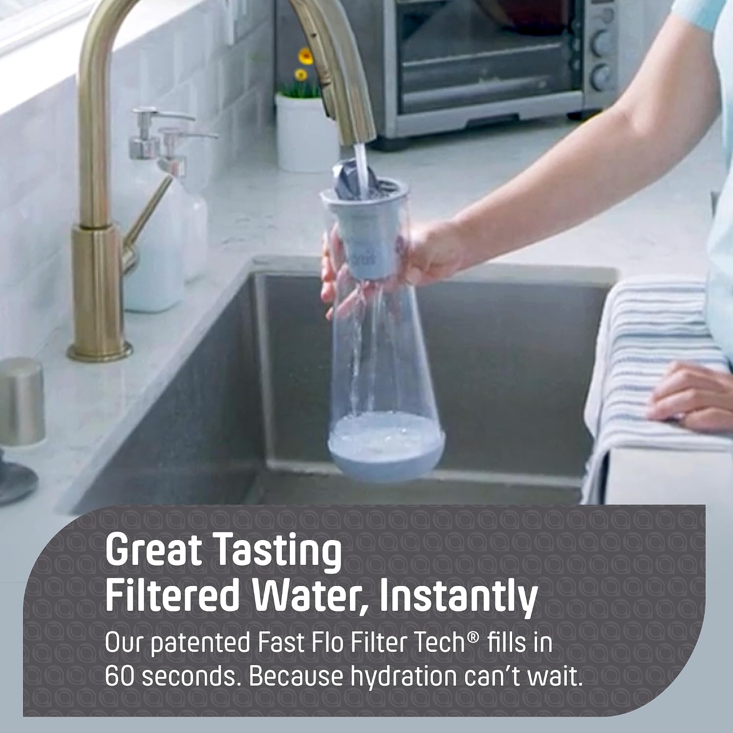 Person holding a water filter over a kitchen sink with promotional text about filtered water.